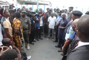 The Chief of Staff, Government House, Port Harcourt, Engr. Emeka Woke (5th right), addressing the Rivers State special sports men and women in Government House, Port Harcourt, during a protest over non-payment of their eight months slaries by the former Governor Chibuike Amaechi administration.