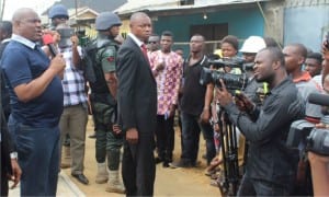 Rivers State Governor, Chief Nyesom Wike (left), addressing Rukpokwu residents and construction contractors, during an inspection of Rukpokwu-Eneka link Road project in Port Harcourt on Saturday.