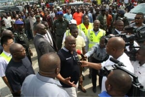 Rivers State Governor, Chief Nyesom Wike (middle), addressing newsmen, during a road project inspection in Port Harcourt, recently