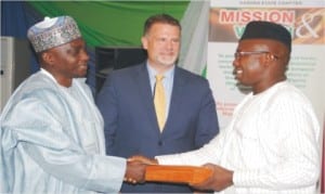 L-R: President, Nigerian-American Chamber of Commerce, Kaduna State Chapter, Alhaji Sheriff Balogun, Deputy Economic Counselor, Embassy of the United State of America, Mr Joel Kopp and the representative of Governor of Kaduna State, Alhaji Shehu Balarebe Musa, at the Nigerian-American Chamber of Commerce’s Annual President's Banquet Awards Nite in Kaduna on Saturday.