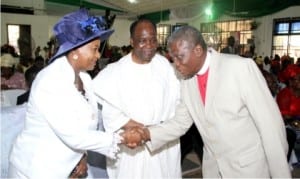 Rivers State Deputy Governor, Dr (Mrs)  Ipalibo Harry Banigo, in a handshake with the General Superintendent of Glorious Covenant Church, Pastor Samuel Akinola (right), during the Nigeria Prays’ South-South Zone’s prayer meeting in Port Harcourt on Sunday. With them is  former Head of State, Gen. Yakubu Gowon (rtd).