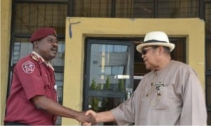 Chairman, Rivers State Council of Traditional Rulers, King Dandeson Douglas Jaja (right), welcoming the Commander, Federal Road Safety Corps, Mr Andrew Ayodele, during a courtesy visit to the state, yesterday.  Photo: Ibioye Diama