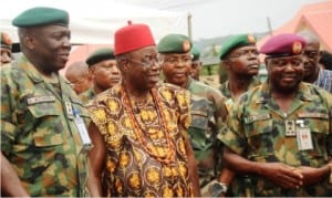 Acting  G.O.C., 82  Division, Nigerian  Army, Brig.-Gen.  Ibrahim  Attahiru, Igwe  of  Nike Enugu State, Igwe Julius Nnaji, and Commander, 82  Division, Nigerian Army Medical Services, Brig.-Gen. Austin Ogbe, during the provision of   free medicare  to the community in Enugu, recently.