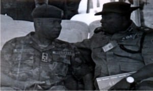 Port Harcourt Brigade Commander, Brigadier S.O. Olabanji, chatting with Bisi Kazeem, during the mega rally organised by FRSC in Port Harcourt, on Thursday.