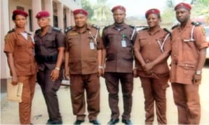 Rivers State Commander, Vigilante Group of Nigeria, Pastor Humphrey Opuada Gally (3rd left), with his Deputy, Comrade Chukwuka Osumah (3rd right), A/C Finance, Rivers State, Mrs Chizoba Chukwu (left), Commander, Obio/Akpor Local Governemnt Area, Ifunaya Owezim (2nd left), Commander, Abua/Odual LGA, Joy Davies and Commander, Okrika Local Government, Ibinabo R. Adoki, during the decoration of officers at the command’s secretariat in Oyigbo, yesterday.