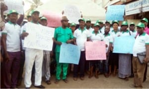 Members of Civil Society Organisations protesting the harassment and humiliation of lawful  Nigerians in Onitsha,   yesterday