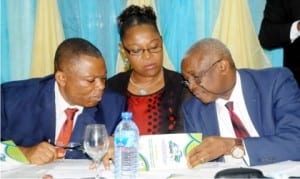 Representative of the Director-General, National Environmental Standards and Regulations Enforcement Agency (NESREA), Mr Victor Ojogbo,  Director,Inspection and Enforcement, Mrs Miranda  Amachree and Director, Partnership Education,  Mr Aniefo Akpabio,   at the NESREA National Regulatory Dialogue on the Implementation of National Environmental Regulations in Nigeria, in Abuja on Monday
