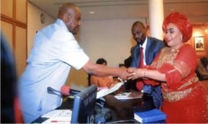 Rivers State Governor, Chief Nyesom Wike (left) congratulating Mrs Tonye Oniyide, during her swearing-in as Commissioner at Government House in Port Harcourt on Friday.                                                                                                                                                           Photo: Chris Monyanaga