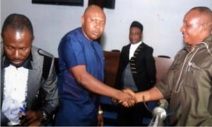  Clerk of Rivers State House of Assembly, Mr Stanford Obah (right), congratulating the new Speaker of the Rivers State House of Assembly, Rt Hon Adams Dabotarudima (2nd left) after his swearing-in ceremony at the House, on Friday.