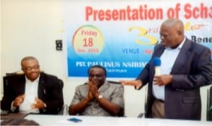 Prince Emma Anyanwu (right), addressing guests, during the Prince Emma Anyanwu Foundation for Journalist in Rivers State Scholarship Award at NUJ Press Centre , Moscow Road, Port Harcourt on Friday. With him, are Director of Enlightment, Ministry of Information and Communciations, Pastor Paulinus Nsirim (middle) and General Manager, RSNC, Mr Celestine Ogolo