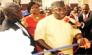 L-R: Chief Executive Officer, Copen Group, Rev. Ugo Chime, Managing Director of the Group, Mrs Chinelo Chime, Governor Ifeanyi Ugwuanyi of Enugu State and President, Enugu Chamber of Commerce, Industry, Mines and Agriculture, Dr Ifeanyi Okoye, at the commissioning of Elim Plaza, in Enugu, recently.