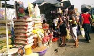 Women shopping for Christmas celebration at Mile I Market in Port Harcourt, yesterday