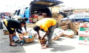 Traders preparing Christmas hampers for sale at Wuse Market in Abuja, yesterday