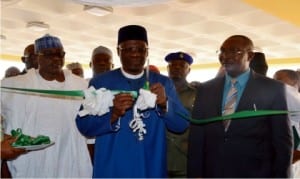 L-R: Director of Special Duties, Federal Ministry of Labour and Employment, Mr Felix Ogenhi, Governor Abdulfatah Ahmed of Kwara State and Director-General, Michael Imoudu National Institute of Labour Studies Dr John Niyi Olanrewaju, during the commissioning of Minils' auditorium in Ilorin on Monday.