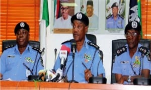 L-R: Deputy Inspector-General of Police, Finance and Administration, Mr Dan'Azumi Doma, Inspector General, Mr. Solomon Arase, and Deputy Inspector-General of Police, Logistics and Supply, Mr Mamman Tsafe, at the Commissioners of Police's end of the Year Conference in Abuja, recently.