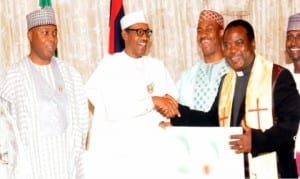 L-R: Senate President, Bukola Saraki, President Muhammadu Buhari, Executive Secretary, Nigerian Christain Pilgrims Commission, Mr Johnkeneddy Opara, President, Christian Association of Nigeria, FCT Chapter, Rev Israel Akanji, and FCT Minister, Mohammed Bello, during a Christmas homage to the President by FCT residents at the Presidential Villa Abuja, on Friday