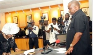 Rivers State Governor, Chief Nyesom Wike (right), swearing-in the  state Chief Judge, Justice Daisy Wotube Okocha at the Executive Council Chamber of Government House, Port Harcourt on Monday.