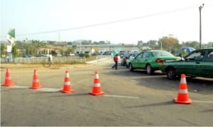 Motorists queuing for fuel on Airport Road as scarcity of the commodity persists in Abuja recently.