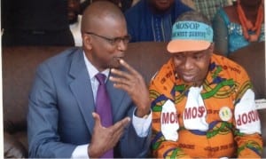 Rivers State  Commissioner for Housing, Barrister Emma Okah (left), chatting with the President of MOSOP, Mr Legbosi Saro Pyagbara, during the 23rd anniversary of Ogoni Day in Bori, recently