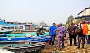 Electoral materials for Bayelsa State governorship Supplementary election being loaded into boats at the Naval Marine Dock in Yenagoa on Friday