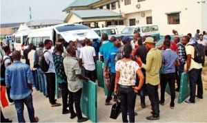 Some Adhoc staff of INEC for Bayelsa State governorship supplementary election proceeding on election duty with non-sensitive materials from the INEC headquarters in Yenagoa on Friday.