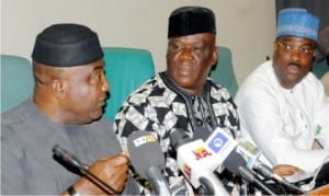 L-R: House of Representatives' Minority Leader, Rep. Leo Ogor; Rep. Jerry Alagbaoso and Rep. Lovett Idisi, at a news conference by the PDP caucus in the House of Representatives on the detention of PDP’s Spokesman, Olisa Metu, in Abuja, yesterday 