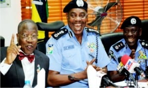 L-R: Minister of Information and Culture, Alhaji Lai Mohammed, Inspector General of Police, Mr Solomon Arase and DIG, Logistics and Supply, Mamman Tsafe, during the Minister's visit to the Force Headquarters in Abuja, yesterday