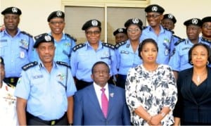 L-R: Front row: I-G Solomon Arase, Minister of Health, Prof. Isaac Adewole, President, Police Officers Wives Association (Powa), Mrs Aragesa Arase, Director of Health Planning, Research and Statistics, Federal Ministry of Health, Dr Ngozi Azodo and other officials at the stakeholders revalidation meeting on Nigeria Police Force's Health Policy, in Abuja, yesterday