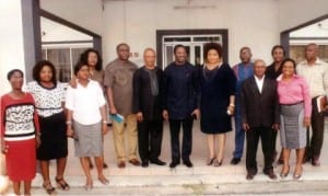 Rivers State Commissioner for Information and Communications, Dr Austin Tam-George (middle), in a group photograph with members and staff of Treasure FM in Port Harcourt, on Wednesday.