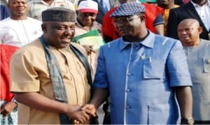 Governor Rochas Okorocha of Imo State (left), in a handshake with the National President of the NLC, Comrade Ayuba Waba, at the Government House in Owerri on Wednesday.