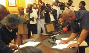 Rivers State Governor, Chief Nyesom Wike (right), swearing-in the new Acting Chief Judge of the state, Justice Adama Iye Iyayi- Lamikanra at the Executive Council Chambers of the Government House, Port Harcourt, on Friday.