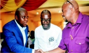  Former Deputy Speaker, House of Representatives, Rt Hon Austin Opara (left), in a handshake with the state Commissioner for Sport, Hon Boma Iyaye (right) and President of Go Round FC, Felix Obuah, during the unveiling ceremony  of the Mascot for Secondary School Athletics Championship in Port Harcourt, yesterday.