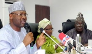 L-R: Chairman, Independent National Electoral Commission (INEC), Prof. Mahmood Yakubu, National Commissioners, Mrs Amina Zakari and Mr Adedeji Soyebi, at the meeting with Civil Society Organisations in Abuja on Thursday