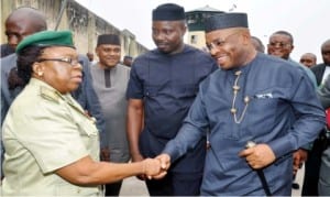 Governor Udom Emmanuel of Akwa Ibom State (right), being received by the Controller of Prisons in Akwa Ibom State, Dr Regina Akpan, during his inspection visit to Ikot Ekpene Prisons on Friday