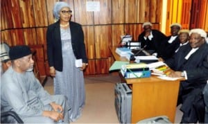 Former National Security A0.dviser (NSA),  Col. Sambo Dasuki (rtd), conferring  with  his lawyers at the High Court of the Federal Capital Territory where he is  standing trial over Alleged Misappropriation of N32 billion arms fund in Abuja on Friday  . The case was adjourned till February  4  for the hearing of the Ex-NSA's  application for stay of proceedings.
