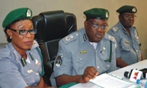 L-R: Acting Deputy Controller of Customs (Revenue), Mrs Elizabeth Isofi,  Controller, Oyo-Osun Area Command, Mr Tolutope Ogunkua  and Deputy Controller (Administration), Mr Abdusallam Hassan, at a news conference on activities of the command In Ibadan on Monday .