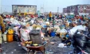 A refuse dump at the Ojoto/Azikiwe Road axis of Diobu in Port Harcourt, before the monthly environmental sanitation excercise on Saturday. The dump has bveen successfully evacuated. Photo: Chris Monyanaga