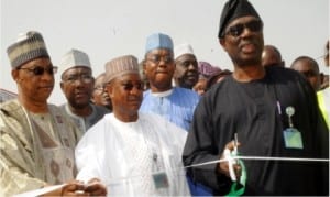 Permanent Secretary, FCT, Dr Babatude Ajakaiye (right), inaugurating the Inner Southern Expressway also known as Goodluck Ebele Jonathan Expressway in Abuja on Friday. With him are the Director of Mass Housing, Federal Capital Development Authority, Mr Umar Jubrin, Director of Engineering, Alhaji Abu Adamu and other officials of the FCT Administration.