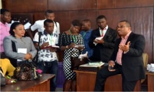 The General Manager, Rivers State Newspaper Corporation, Mr Celestine Ogolo (right), addressing students of the International Institute of Journalism, during a capacity building tour of the corporation in Port Harcourt on Monday       			      Photo: Ibioye Diama