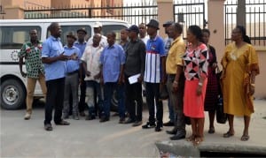 NLC’s Picketing Committee Chairman, Comrade Franklin Ariolu (2nd left), addressing members of the union on the nationwide picketing of PHED offices in Port Harcourt on Monday.