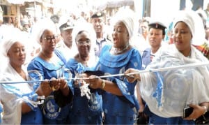 President of Nigerian Navy Officers' Wives Association (NOWA), Mrs Theresa Ibas (4th left), inaugurating the new NOWA office Block at Borokiri Market in Port Harcourt, yesterday. With her are other national and state officials of NOWA.