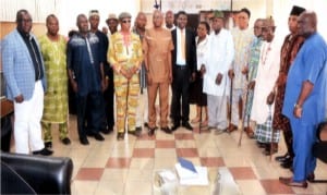 Rivers State Commissioner for Works, Engr. Kevin Kinikanwo Wachukwu (middle), with Permanent Secretary, Mr James Enebeli (right) and Director, Civil Engineering Department, Engr. Juhara Okeyes ( right) and in a group chiefs and elders of Anaka village in Ogbogoro community, Obio/Akpor LGA.