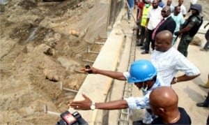 Governor Nyesom Wike of Rivers State (3rd left), inspecting the Nkpogu/NLNG bridge project in Port Harcourt on Saturday