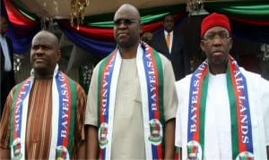 Rivers State Governor, Chief Nyesom Ezenwo Wike (left), with Ekiti State Governor, Mr Ayo Fayose (middle) and their Delta State counterpart, Senator Ifeanyi Okowa, during the swearing-in-of Bayelsa State Governor, Seriake Dickson in Yenagoa, on Sunday..