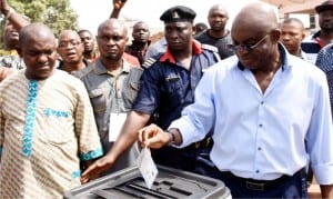 Peoples Democratic Party’s candidate and former Senate President, David Mark, casting his vote at Otukpo,  Ward 1, during the Benue South Senatorial election re-run in Benue State, on Saturday.