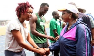 Flash back :Rivers State Deputy Governor, Dr (Mrs) Ipalibo Harry Banigo,  in  a handshake, with the former World 100 metres Gold Medalist, Miss Endurance Ojokolo, during the Go Round/SWAN Secondary Schools Athletics Championship at Adokiye Amiesimaka Satdium in Port Harcourt. 