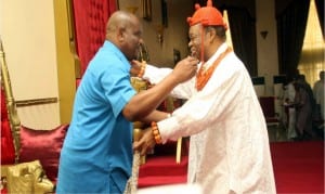 Rivers State Governor,Chief Nyesom  Wike (left), in warm embrace with the  Oba of Ogbaland, Sir Chukwumela Nnam Obi, during a Special Security  Town Hall Meeting in Omoku on Monday  