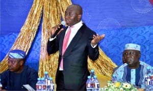 R-L: Manager,  First Bank Plc, Abakpa branch,  Enugu, Chinenye Okoli, Chairman of the occasion, Chief Uche Nnadi and Managing Director, KSLEY Mega Micro Finance Bank, Mr Ubenyi Amaechi, during the inauguration of the Micro-Finance Institute in Enugu, recently.