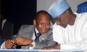 Accountant General of the Federation, Alhaji Ahmed Idris (left), discussing with FCT Minister, Alhaji Mohammed Bello, at the 2016 Federal Inland Revenue Service’s Coporate Strategy Retreat in Abuja recently.