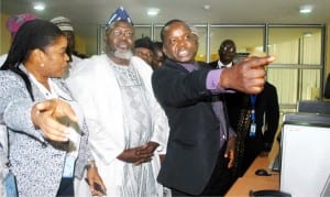 L-R: Managing Director, Nigerian Communication Satellite (NIGCOMSAT), Mrs Abimbola Alale, Minister of Communication and Technology, Mr Adebayo Shitu and the NIGCOMSAT’s  General-Manager, Satellite Operations, Mr Danjuma Ndihgihdah, during the NIGCOMSAT’s  facility tour by the minister in Abuja, recently.